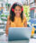 Young woman working on a laptop computer