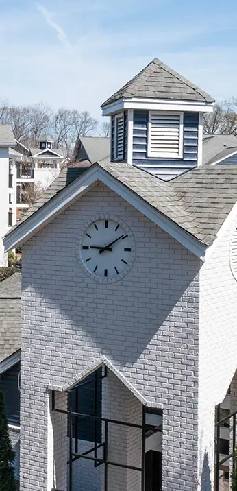building with a decorative clock